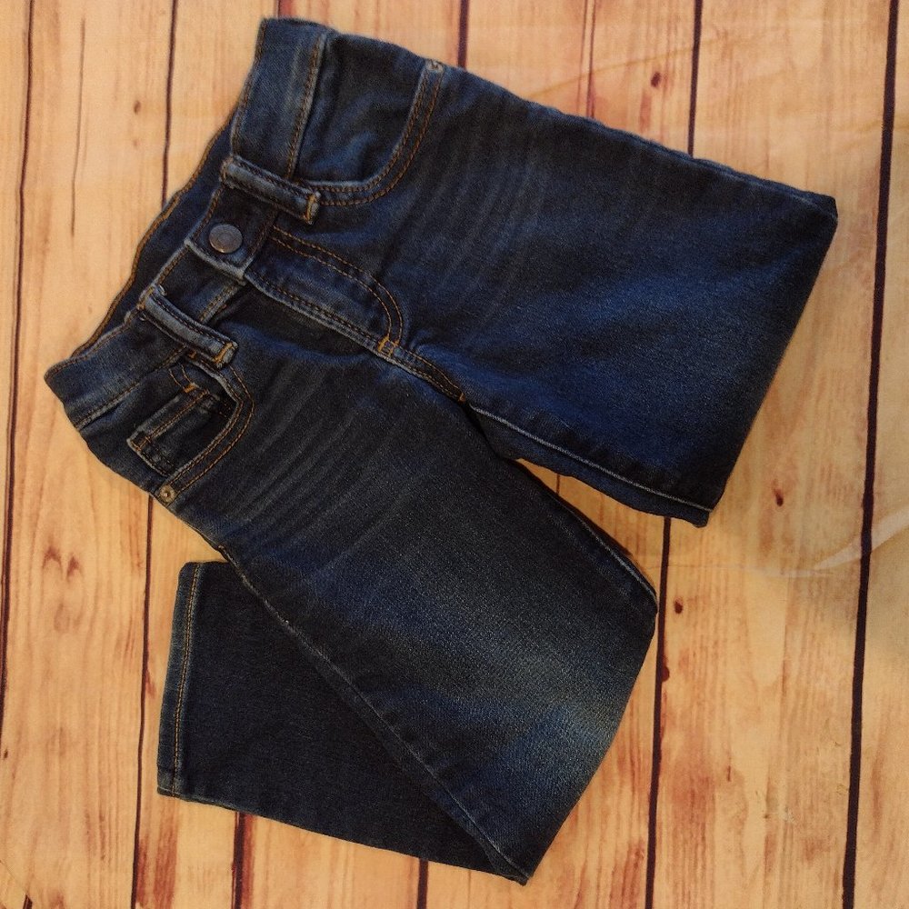 Gap toddler girl size 4 dark wash skinny jeans.  Button elastic in waist.